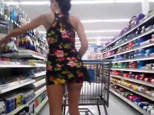 Horny doll hoists up her mini sundress in the store