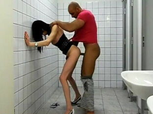 Smashing thin ladyboy in the public restroom