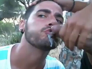 Brazilian man getting jism stream in jaws outdoor