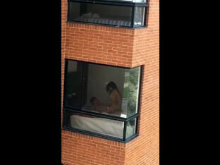 Hidden cam hookup movie filmed thru dormitory balcony window